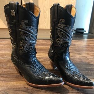 Black cowboy boots with cream and gold stitching